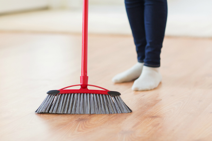 sweeping the house